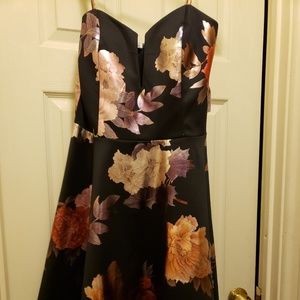 Black dress with metallic like flowers